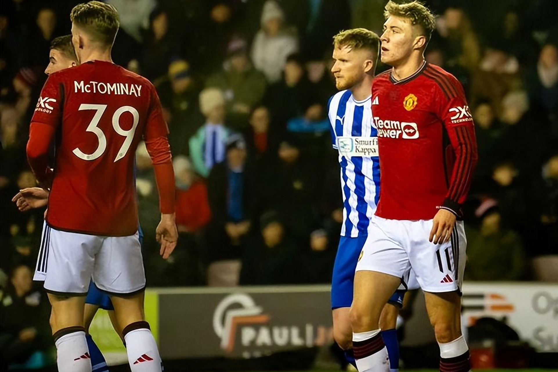 世俱杯分组-维冈竞技主场击败对手，提升排名